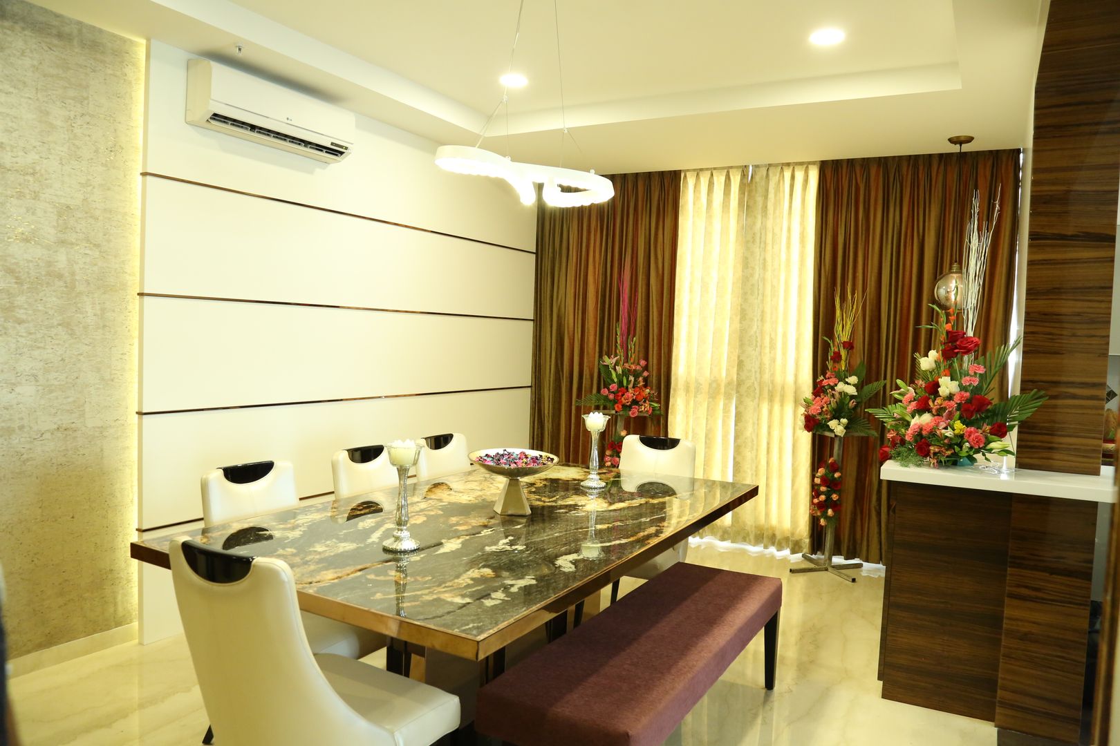 Apartment interiors at Sattva Luxuria, Studio Stimulus Studio Stimulus ห้องทานข้าว