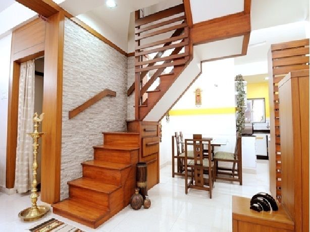 Stone Wall and Wooden Stairs a Perfect Combination.... homify Living room