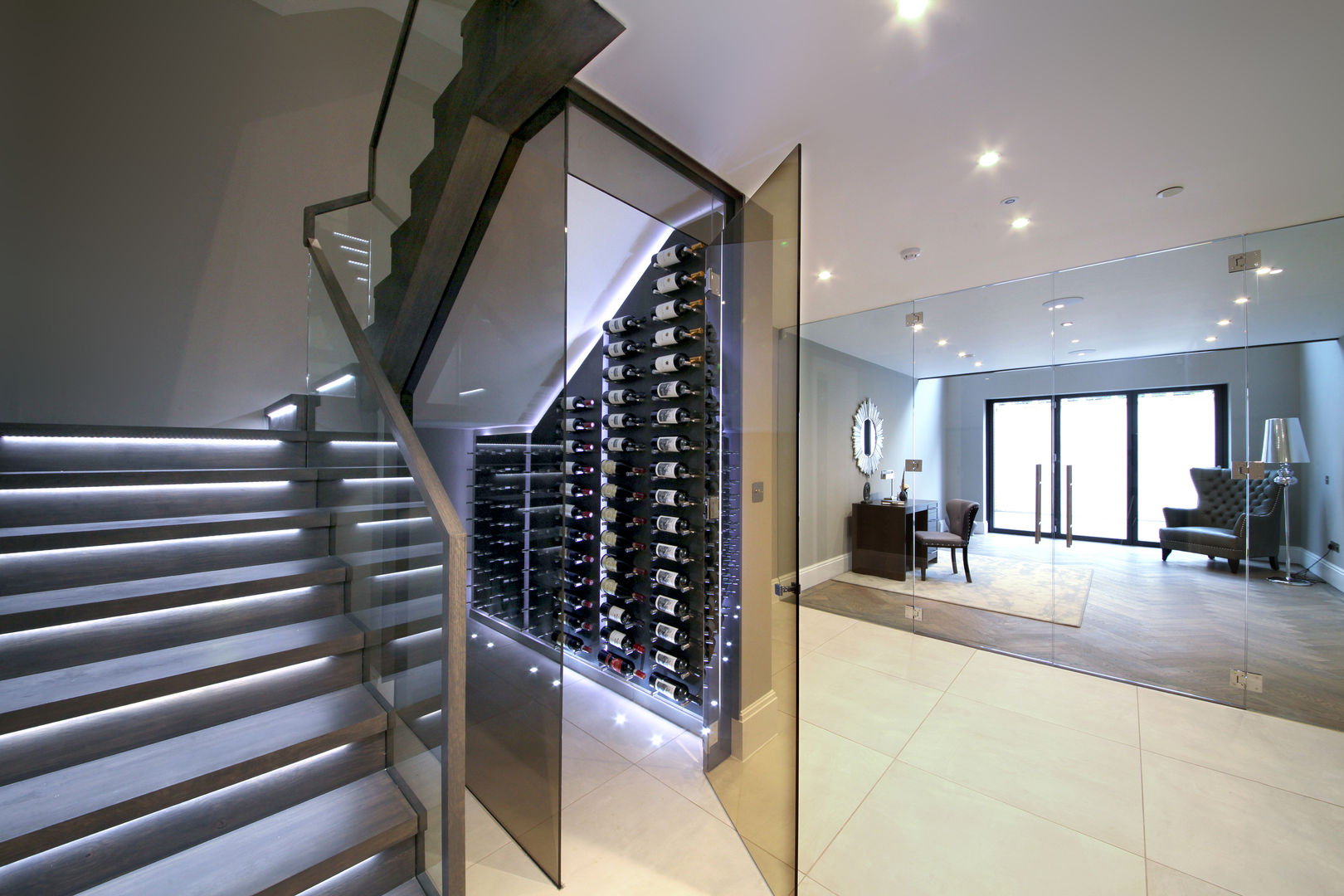 ​A complex project, in which #RailingLondon worked on a staircase, internal doors, interior and exterior balustrades and a Juliet balcony. Railing London Ltd Modern wine cellar