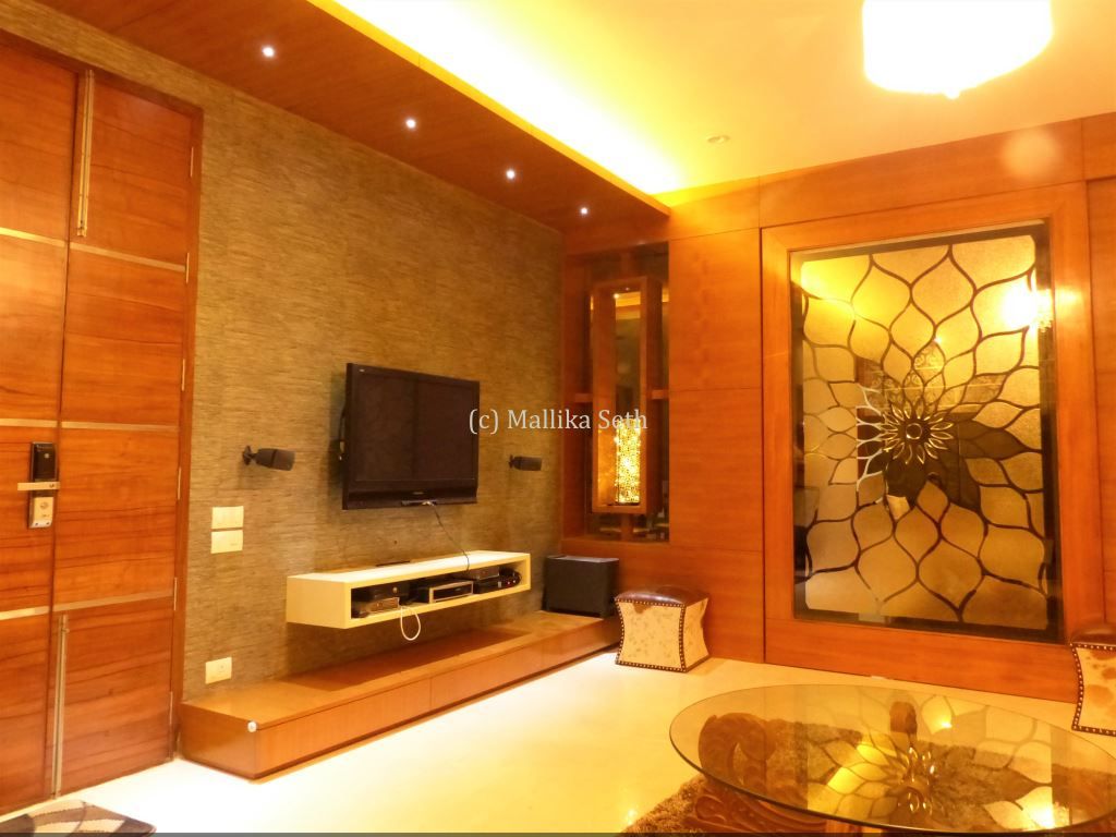 Interiors for a Villa at Ferns Paradise, Bangalore, Mallika Seth Mallika Seth Ruang Media Gaya Industrial