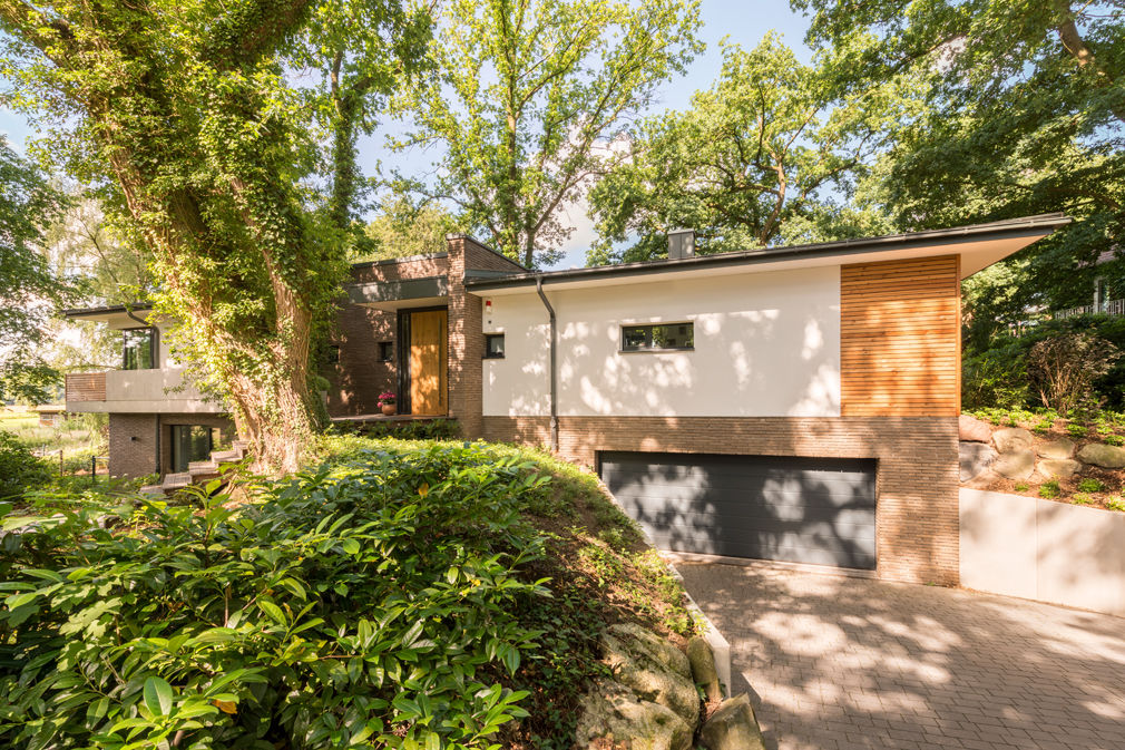 Einfamilienhaus TW12, Hellmers P2 | Architektur & Projekte Hellmers P2 | Architektur & Projekte Modern garage/shed Wood Wood effect