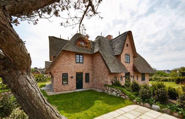 Haus auf Sylt, SALLIER WOHNEN SYLT SALLIER WOHNEN SYLT Jardins modernos Pedra