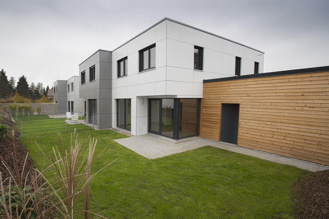 Effizienzhaus-Quartier, plusEnergieArchitektur plusEnergieArchitektur Casas modernas