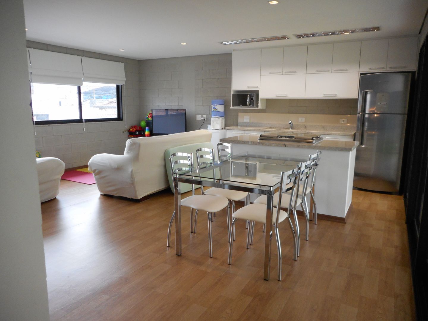 Casa de Bloco Aparente, Metamorfose Arquitetura e Urbanismo Metamorfose Arquitetura e Urbanismo Rustic style dining room