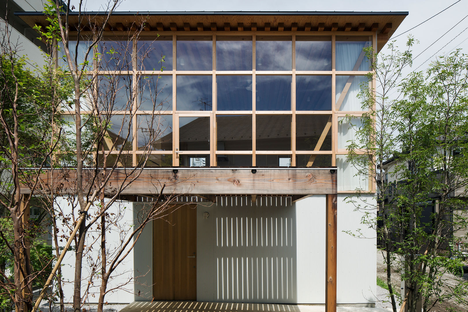 module grid house, 山路哲生建築設計事務所 山路哲生建築設計事務所 Fenêtres & Portes originales Bois Effet bois