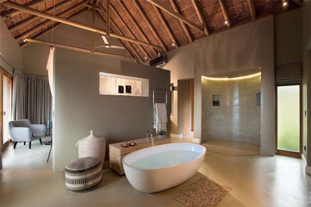 Mhondoro, een Lodge in Zuid-Afrika, All-In Living All-In Living Baños modernos