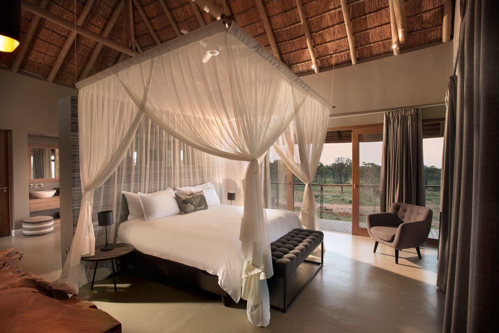 Mhondoro, een Lodge in Zuid-Afrika, All-In Living All-In Living モダンスタイルの寝室