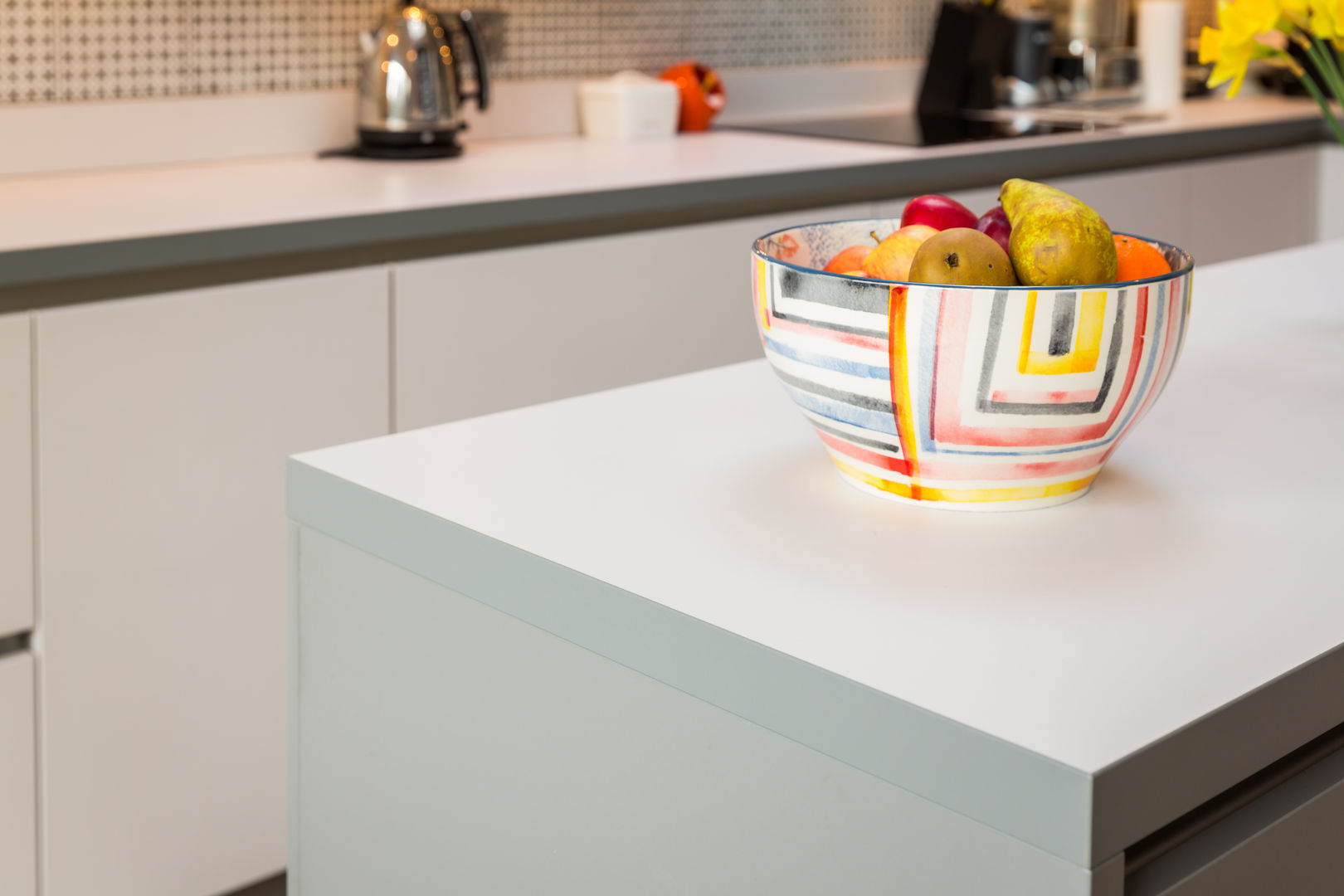 Nobilia 20mm Laser laminate door in Satin and Mineral Grey Eco German Kitchens Moderne keukens Spaanplaat Nobilia kitchen furniture in a 20mm laminate door with two colours satin grey and mineral grey to give a wonderful contrast between the cabinets along the wall and the island.