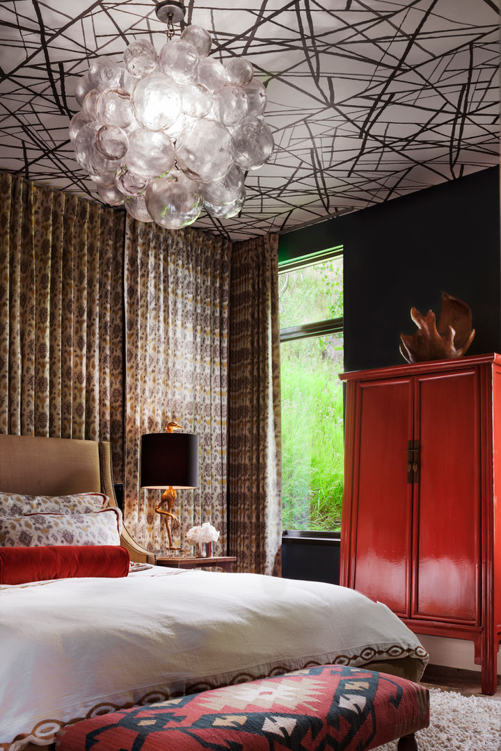 Vail Valley Retreat, Andrea Schumacher Interiors Andrea Schumacher Interiors Eclectic style bedroom wallpapered ceiling,chandelier,asian armoire,drapery,table lamp,night table,upholstered headboard,euro pillows,bolster,'
