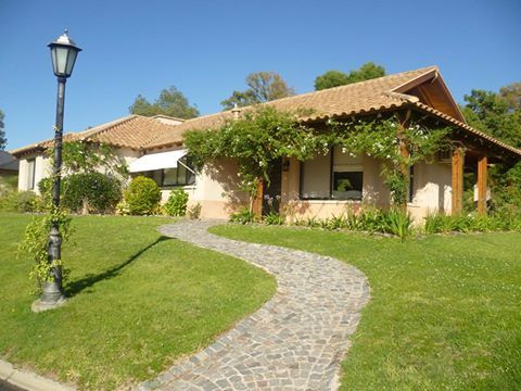 Casa en Fincas del Lago Arquitecto De Angelis Casas de estilo rural