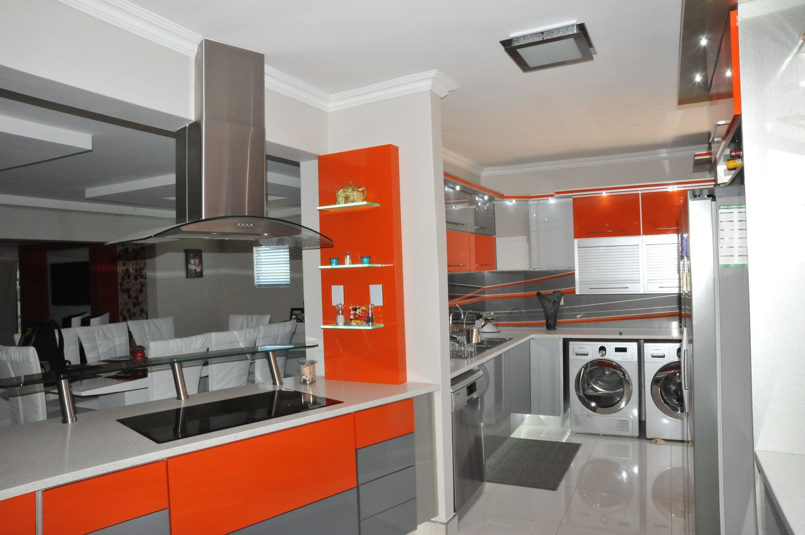 Orange and Silver Niemann Kitchen with Cesar Stone Work Tops., Expert Kitchens and Interiors Expert Kitchens and Interiors Кухня