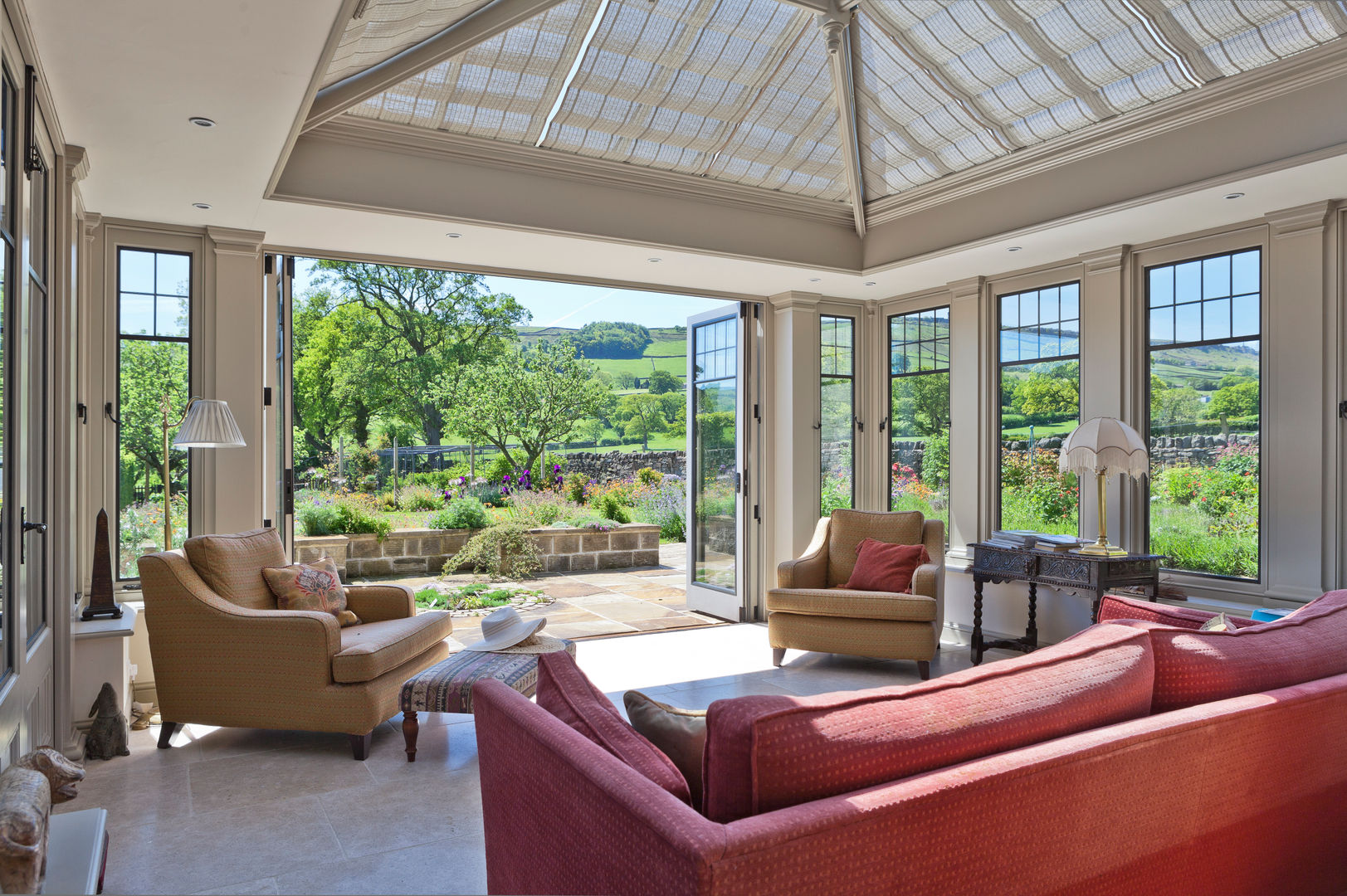 Conservatory with Bronze Casement Windows on a Period Farmhouse Vale Garden Houses Classic style conservatory Tiles