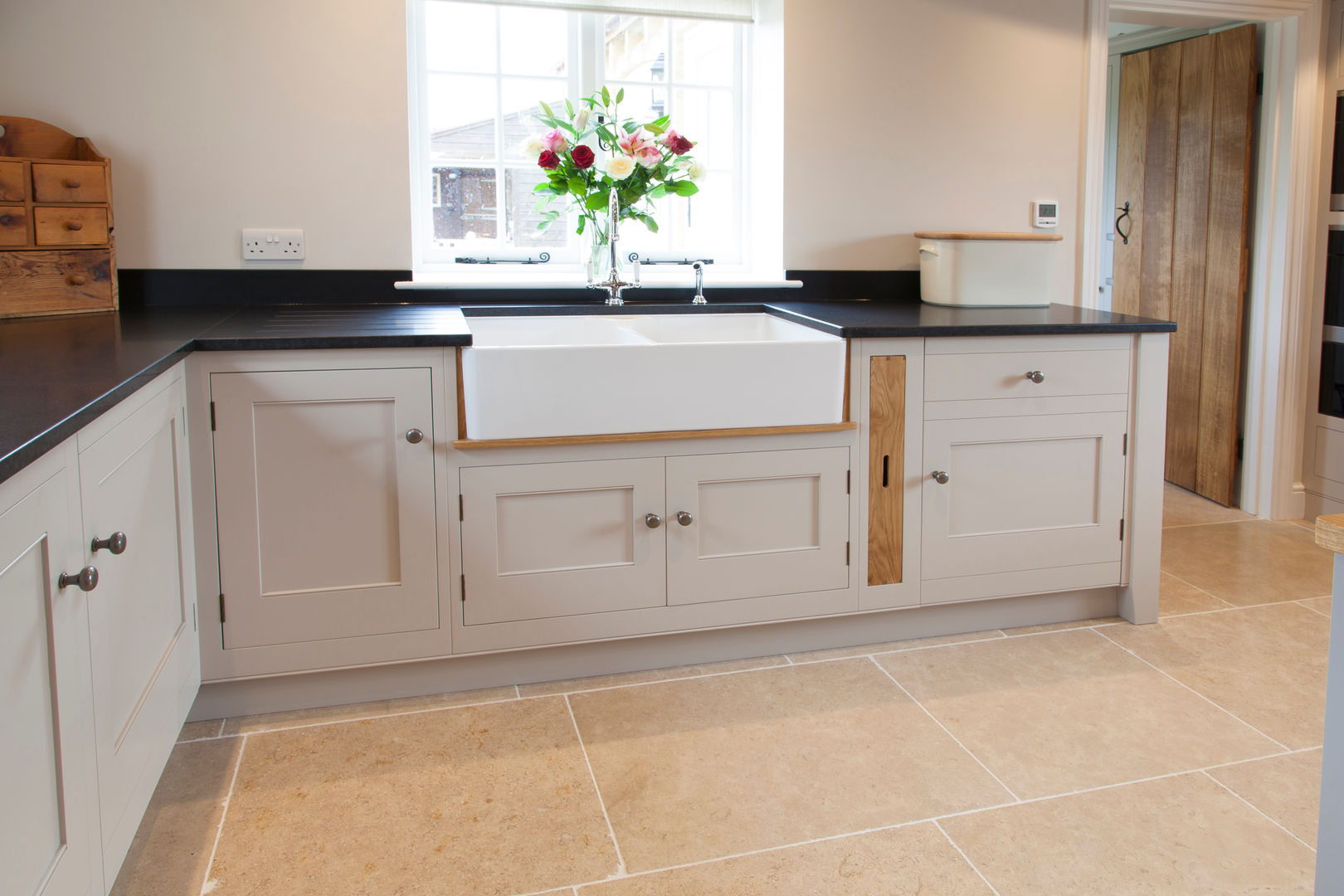 Old English - Bespoke kitchen project in Cambridgeshire Baker & Baker Rustic style kitchen Butler sink. tile floor,tray,kitchen cabinets