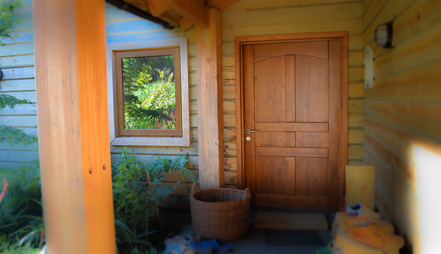 Puerta de acceso Ignisterra S.A. Puertas y ventanas clásicas Madera Acabado en madera