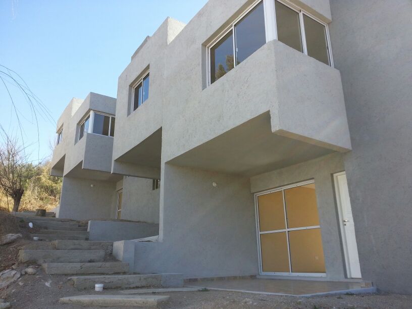 Complejo Duplex, ARQUITECTA CARINA BASSINO ARQUITECTA CARINA BASSINO Modern Houses