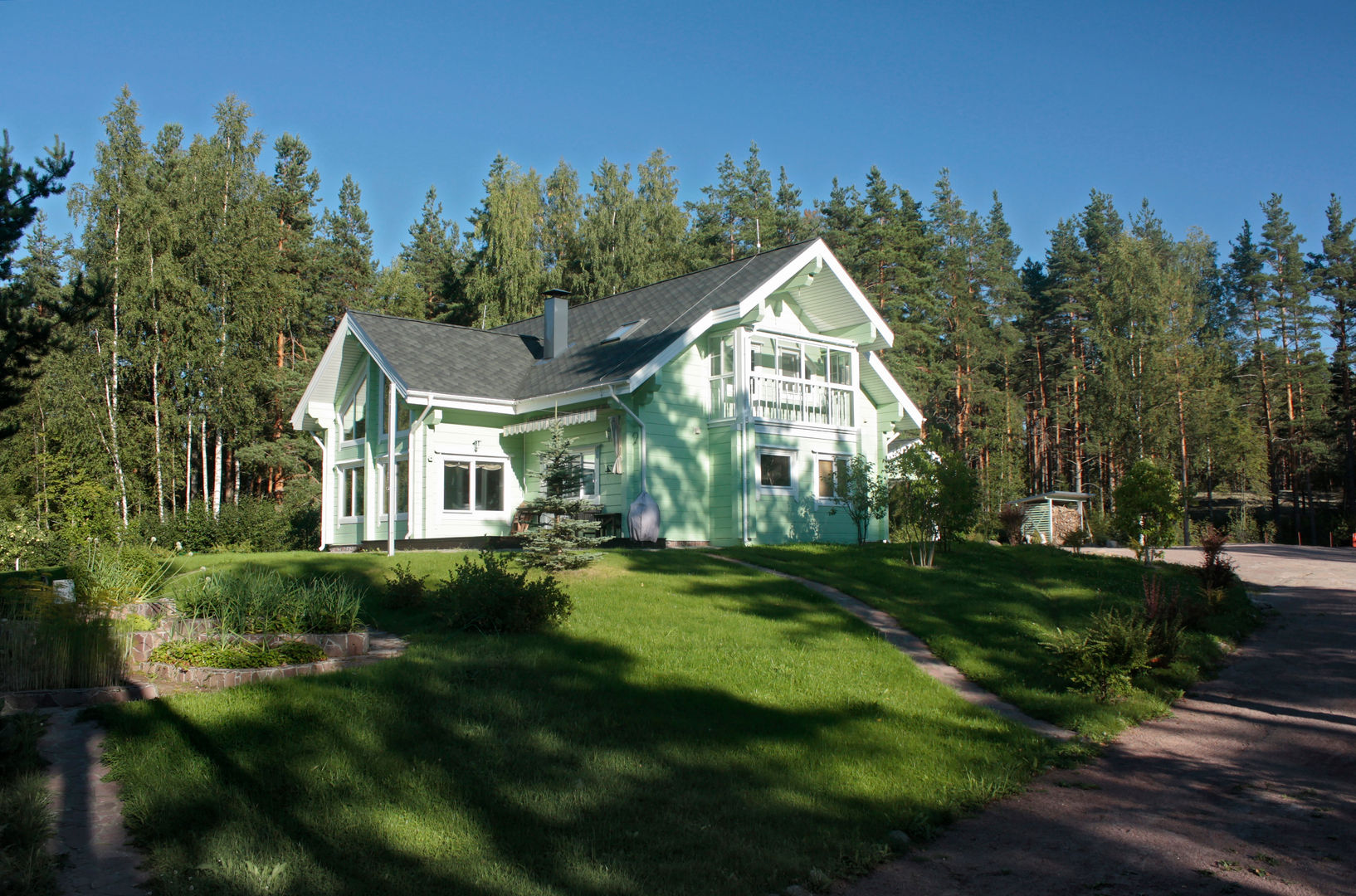 Загородный дом из клееного бруса, Дмитрий Кругляк Дмитрий Кругляк Rustic style house