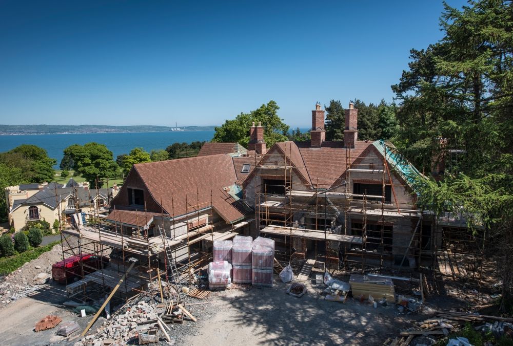 Arts and Crafts style home for a Surrey client., Des Ewing Residential Architects Des Ewing Residential Architects ラスティックな 家