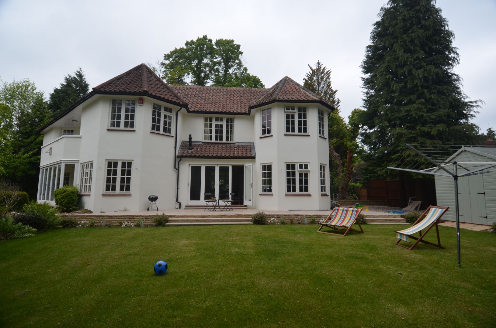 Side extension showing nothing of the subtle loft conversion Loft Architect Country style house roof space conversion