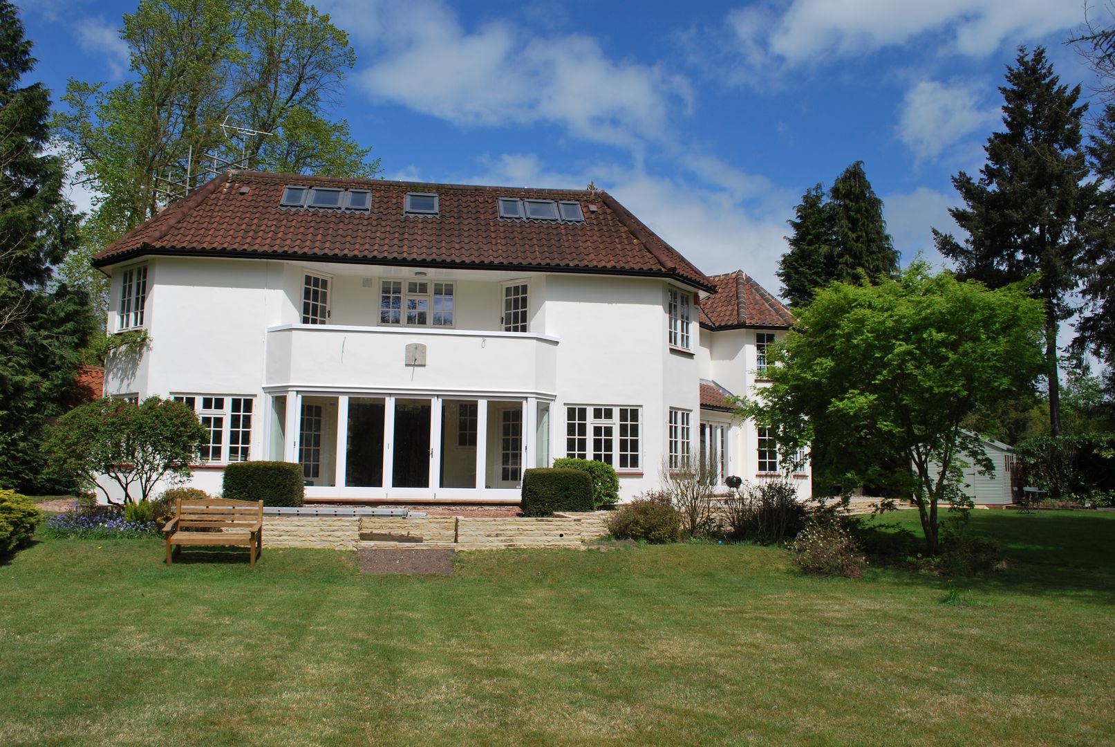 The rear Art Deco facade, the only real presence of the loft conversion Loft Architect Country style house Roof lights attic conversion