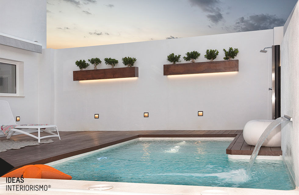 Terraza de diseño en Valencia. Ideas Interiorismo Exclusivo, SLU Balcones y terrazas mediterráneos