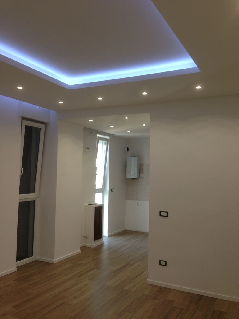 Soggiorno Cozzi Arch. Mauro Soggiorno moderno controsoffitto,soggiorno,faretti,luce led