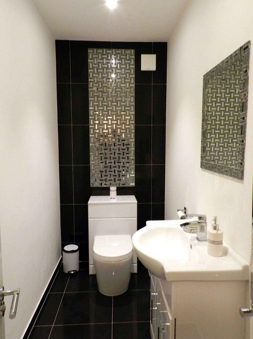 Ground floor guest toilet XTid Associates حمام بلاط bathdroom,black porcelain floor,cloakroom,heating,comtemporary,sink,toilet,mirrors,black and white,guest toilet