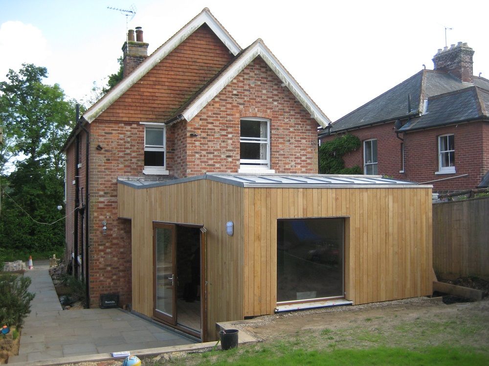 Timber Wave Family Room, East Sussex, Elemental Architecture Elemental Architecture Case moderne