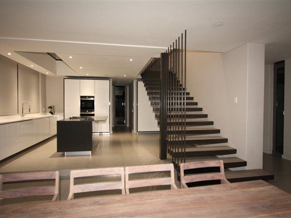 Staircase E2 Architects Minimalist kitchen Iron/Steel