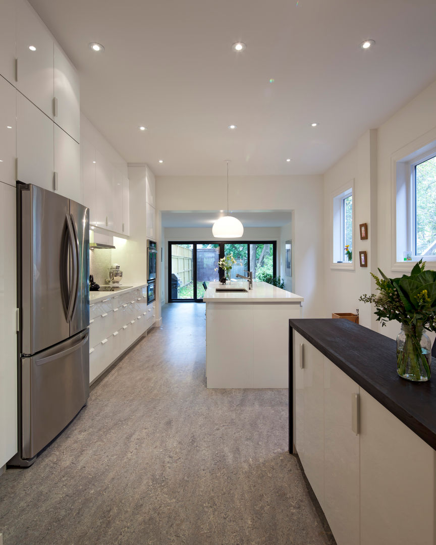 Old Victorian Home Modern Renovation - Harvard Ave, STUDIO Z STUDIO Z Kitchen black windows,bubble pendant light,custom built-ins,dark wood countertop,milk glass pendant,white kitchen,marmoleum flooring,Caesarstone counter