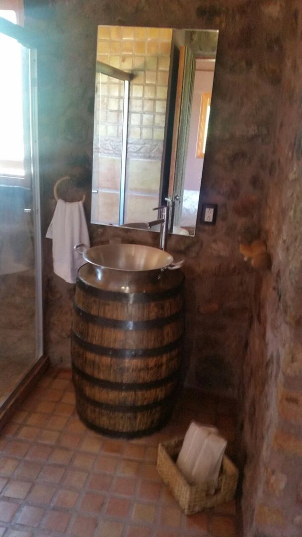 BUNGALOW PAPIRO, Cervantes Bueno arquitectura Cervantes Bueno arquitectura Rustic style bathroom Stone