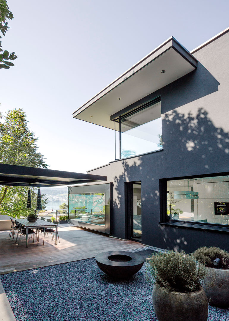 Objekt 336: Traumhaftes Einfamilienhaus mit Panoramablick , meier architekten zürich meier architekten zürich Modern style balcony, porch & terrace Wood Wood effect