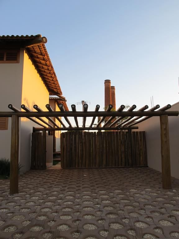 Casa Sauípe, Cia de Arquitetura Cia de Arquitetura Rustic style garage/shed