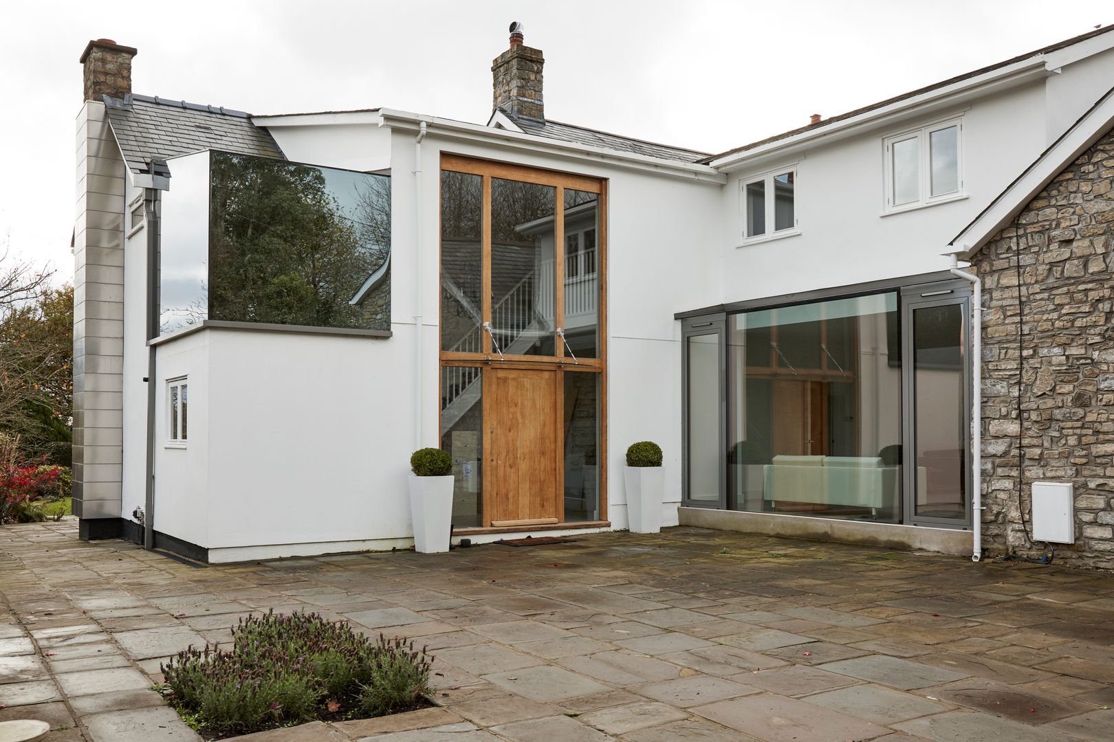 External photo Trombe Ltd Будинки glass,mirror finish,extension,doors,structural glazing,bathroom,living room,frameless