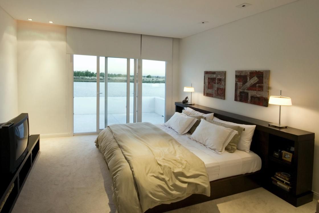 Mastersuite CIBA ARQUITECTURA Dormitorios modernos: Ideas, imágenes y decoración suite,lago,terraza