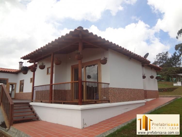 Casa Prefabricada en Bogota, PREFABRICASA PREFABRICASA Rustic style house