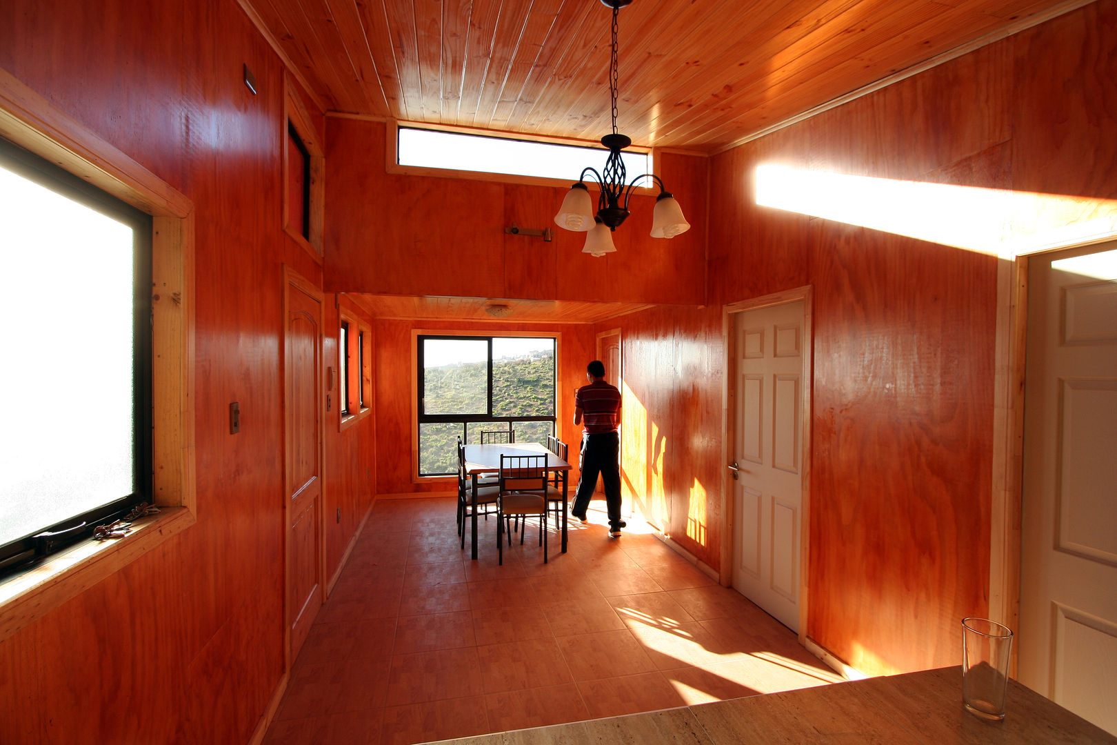 Interior de la vivienda Arq2g Comedores modernos Madera Acabado en madera