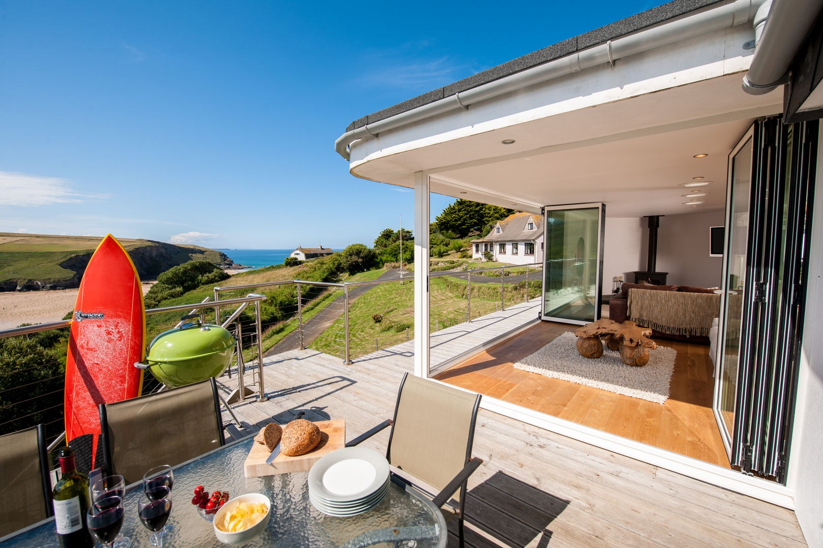 homify Eclectic style houses holiday home,balcony,patio doors,sliding doors,outside dining,external,beach views