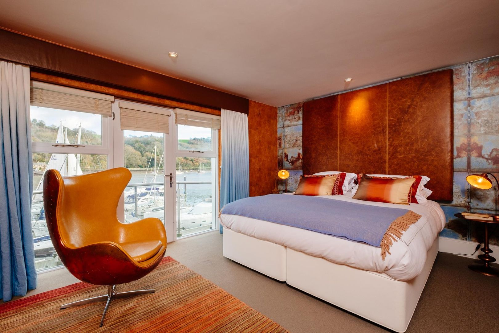 homify Cuartos de estilo ecléctico bedroom,copper,leather,holiday home,sea views,balcony