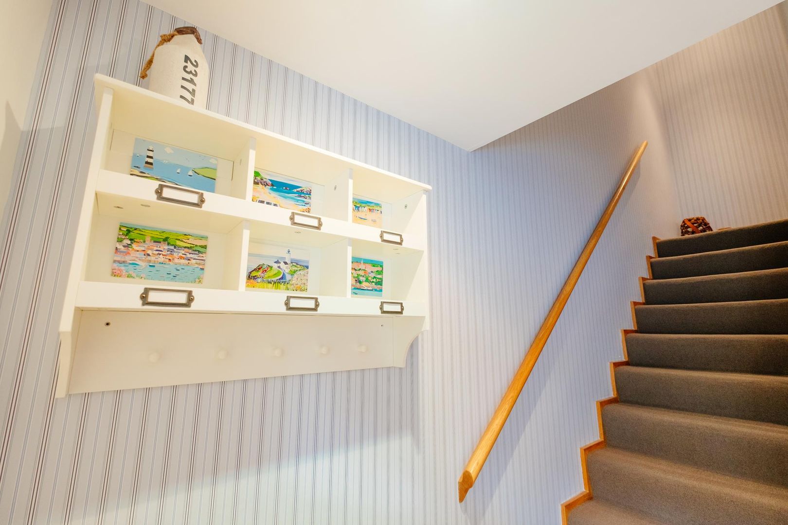 homify Eclectic style corridor, hallway & stairs holiday home,stairs,wallpaper