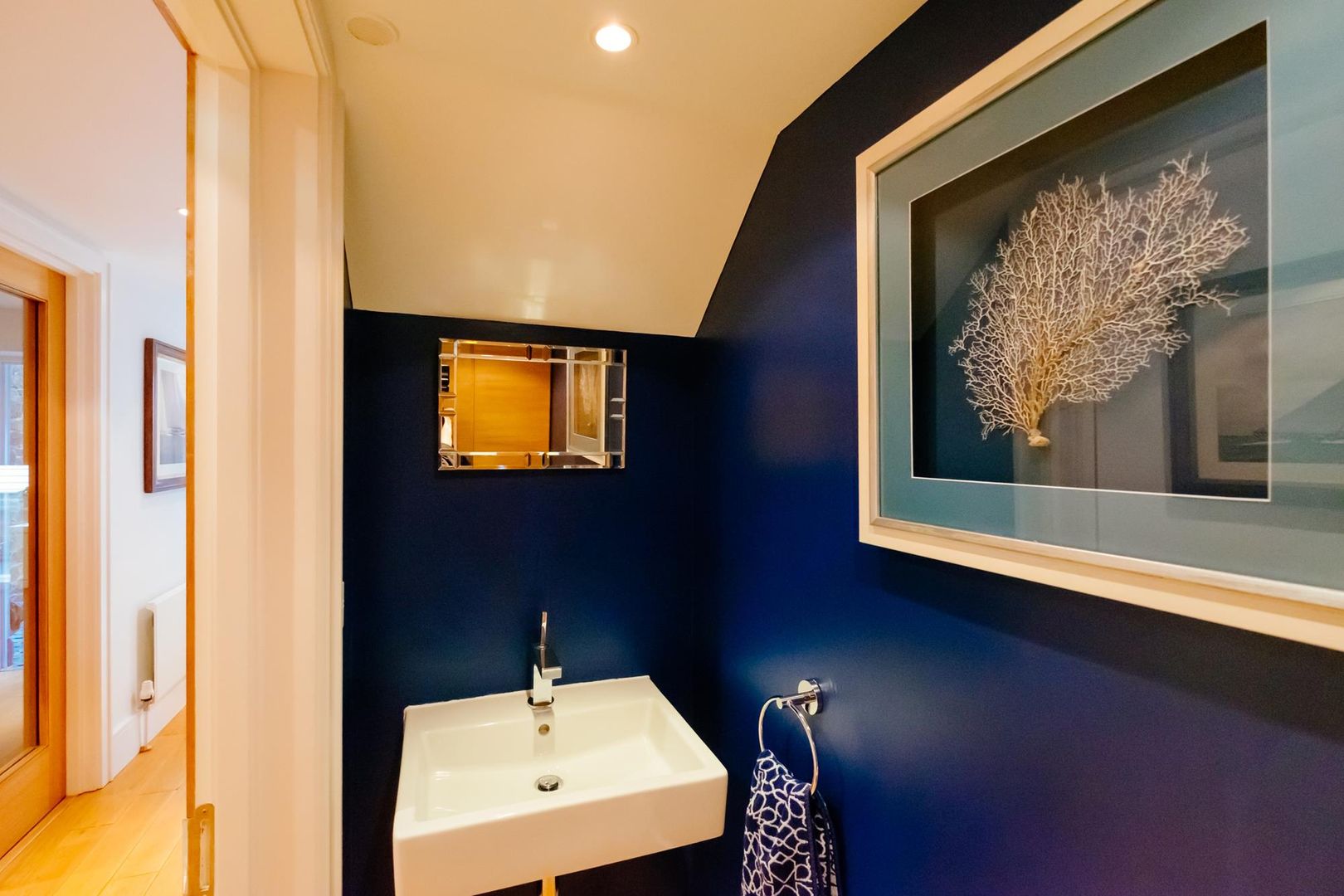 homify Ванна кімната Bathroom,blue,wall hung basin,chrome bottle trap,holiday home