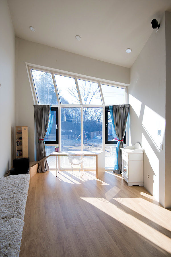 homify Puertas y ventanas modernas