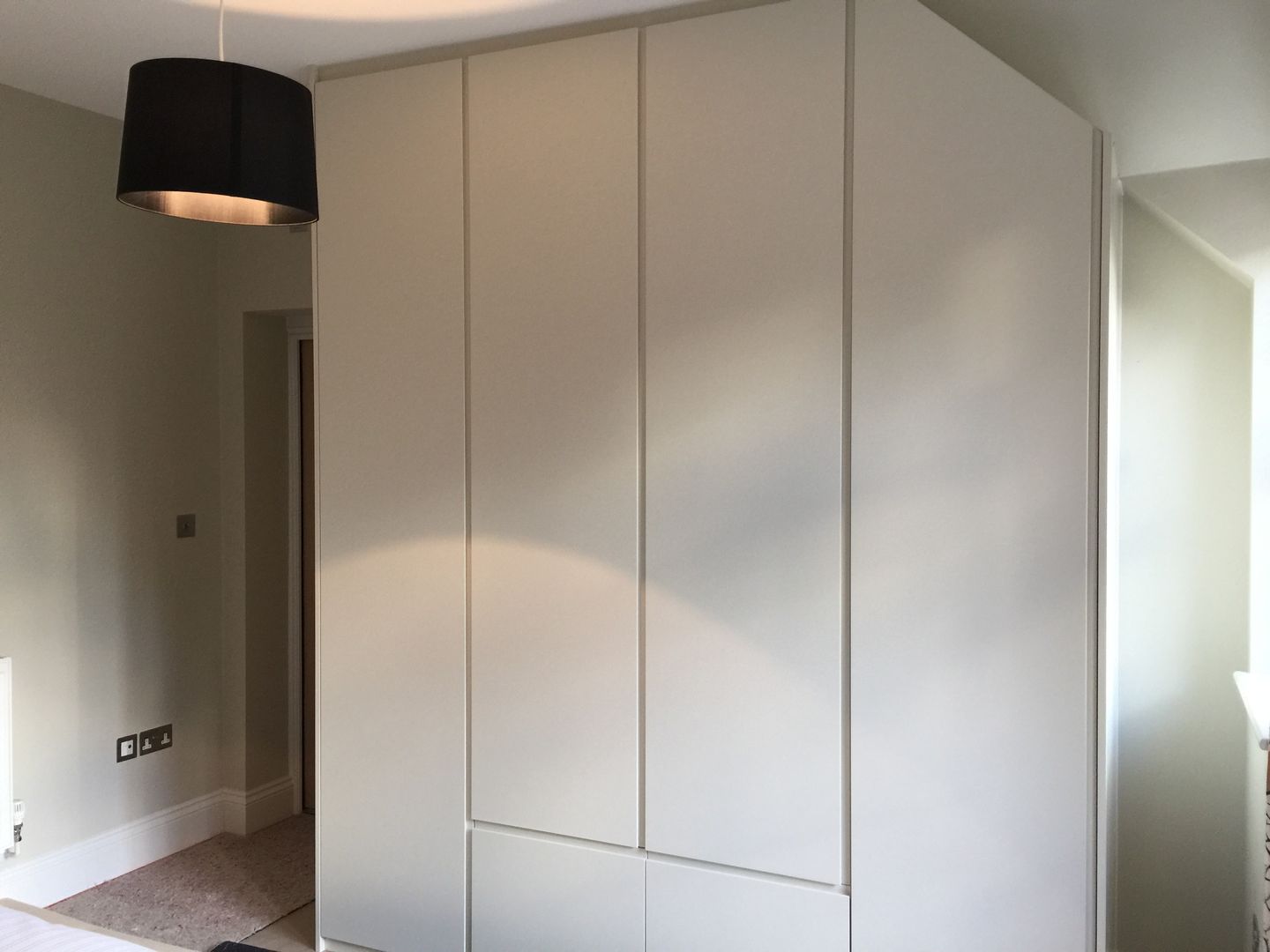 Oyster white hinged door wardrobes with handleless doors and drawers Sliding Wardrobes World Ltd Bedroom Wardrobes & closets