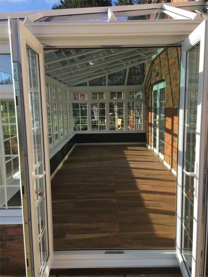 Inside the New Conservatory homify Giardino d'inverno in stile classico conservatory,wood flooring