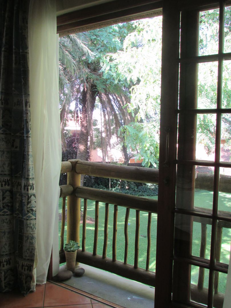 View from the balcony of the guest bedroom homify Country style balcony, veranda & terrace Accessories & decoration