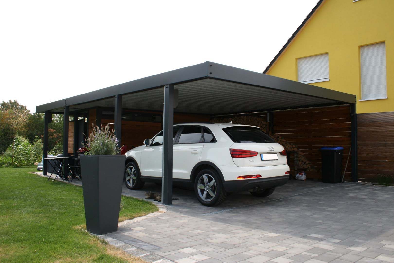 homify Garagens e edículas modernas