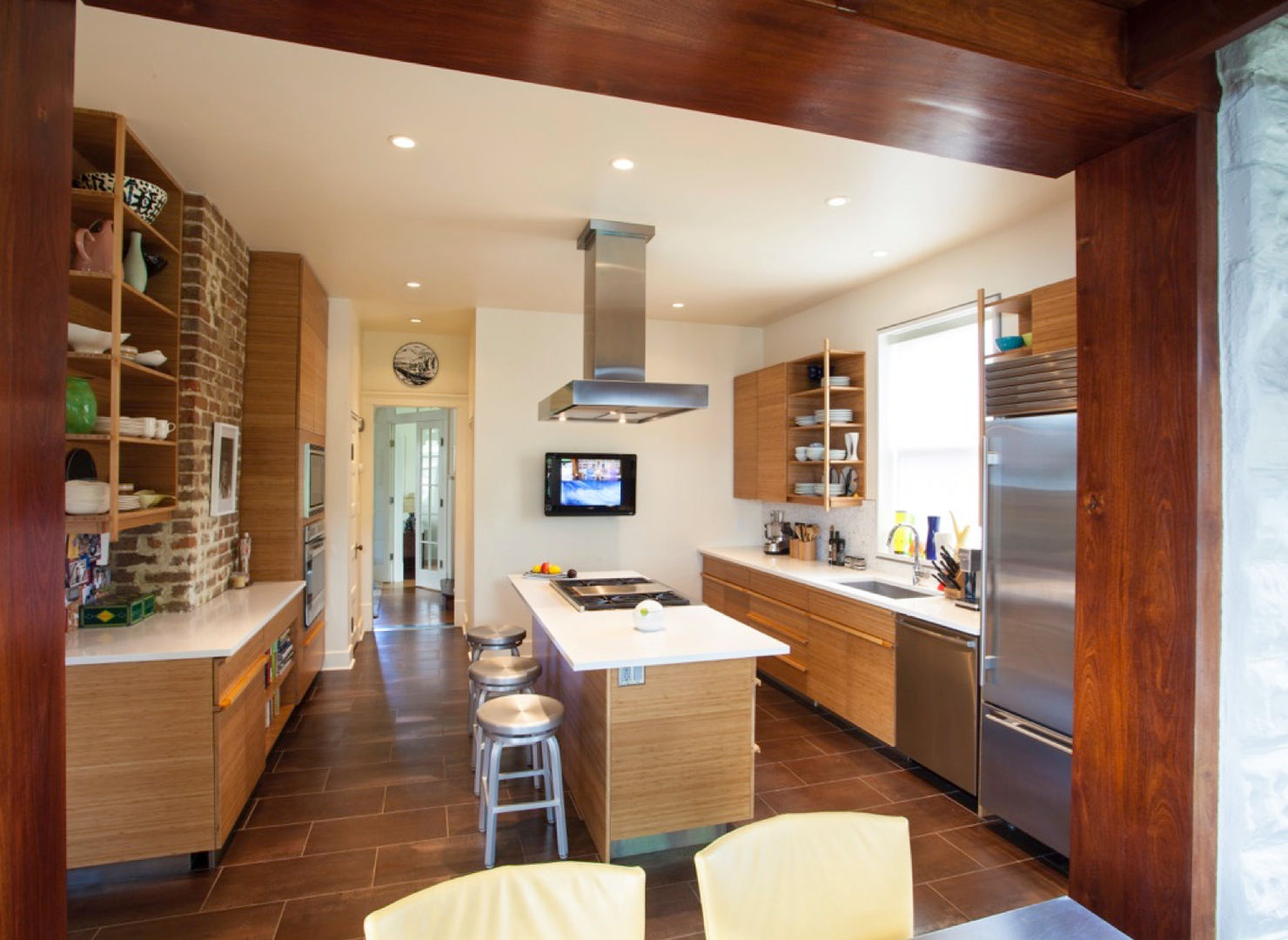 City Park Residence, New Orleans studioWTA Modern Kitchen bamboo,bamboo plywood,millwork,brick,chimney,quartz countertop,renovation,Wayne Troyer,studioWTA,Toni DiMaggio