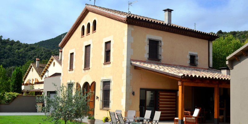 REHABILITACIÓN DE UNA MASÍA CATALANA DEL S. XVII EN BARCELONA, Estudio Arquitectura Ricardo Pérez Asin Estudio Arquitectura Ricardo Pérez Asin Houses