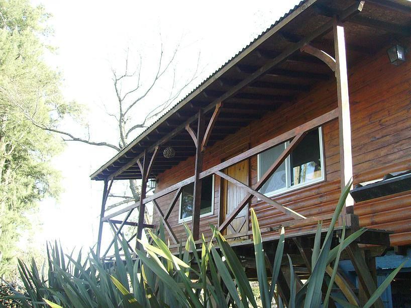 Cabañas de Madera, Carpintería y Decoración La Cucha Carpintería y Decoración La Cucha Rustic style houses