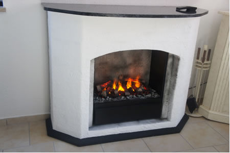 MANUFAKTUR ELEKTROKAMIN ATHEN DE LUXE, RAUHPUTZ, Gebr. Garvens GmbH & Co. KG Gebr. Garvens GmbH & Co. KG Phòng khách phong cách Địa Trung Hải Fireplaces & accessories