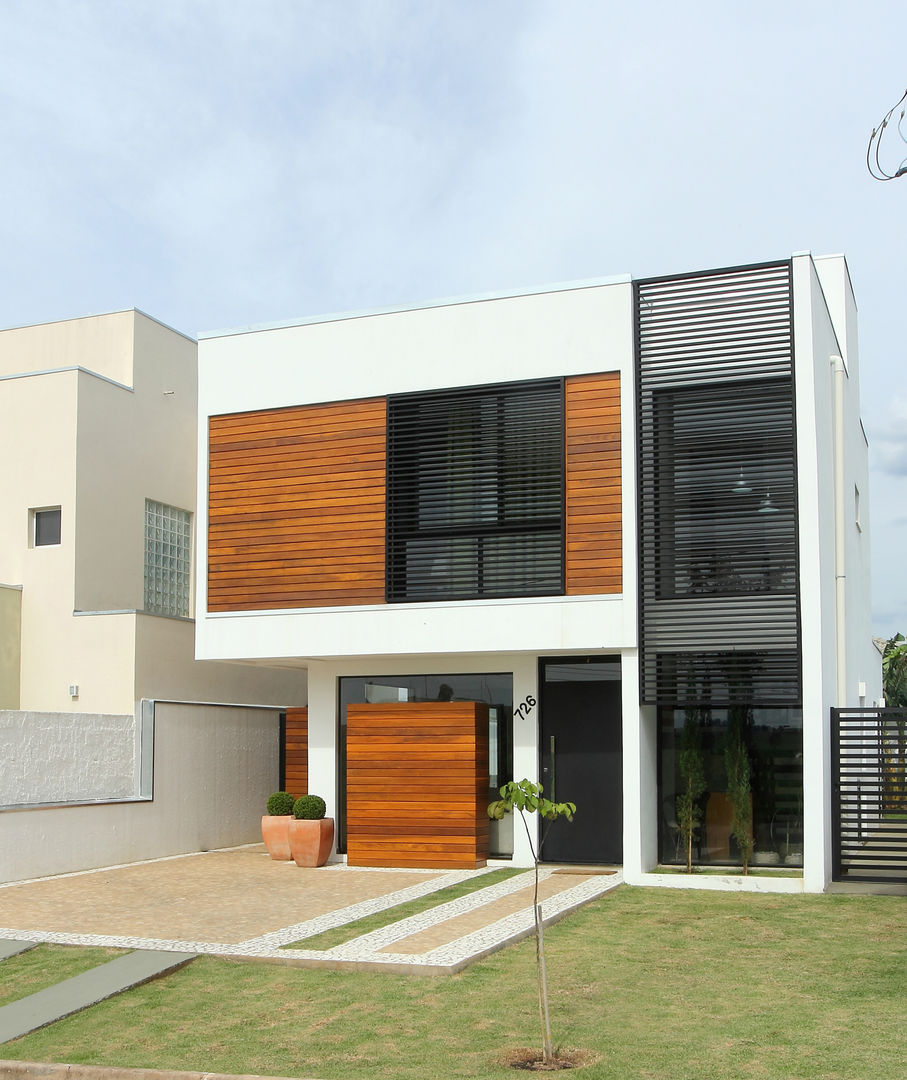 Casa AT, Taguá Arquitetura Taguá Arquitetura Casas modernas Madera Acabado en madera